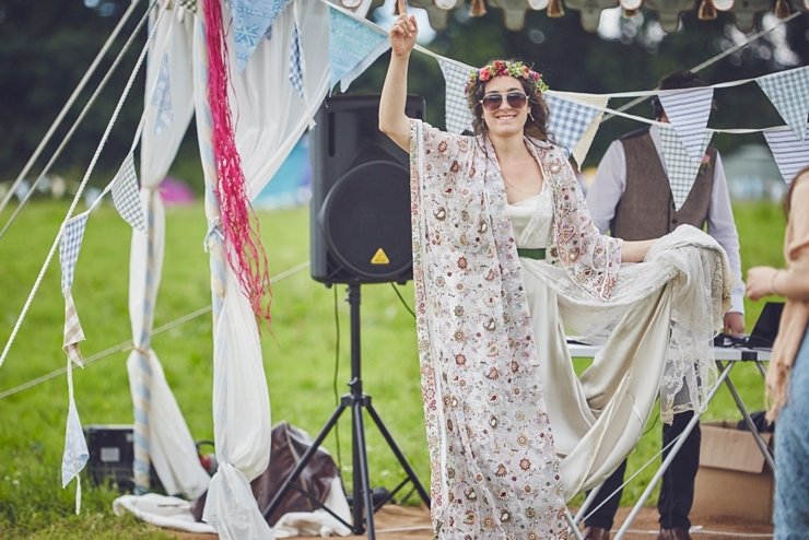 boho bride dancing to outdoor disco at diy Yury wedding in Dorset