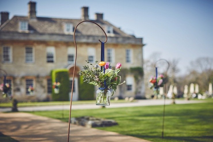 floral arrangement in pewter wedding photography Babington House Somerset