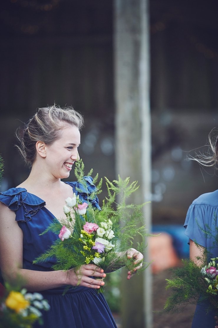 bridesmaid smiling before blessing at East Soar in Devon
