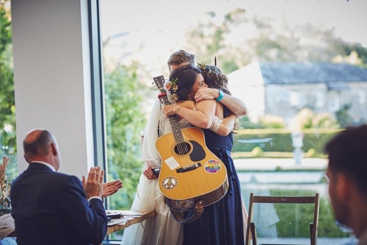 relaxed wedding photography of speeches at Kingston Estate Devon