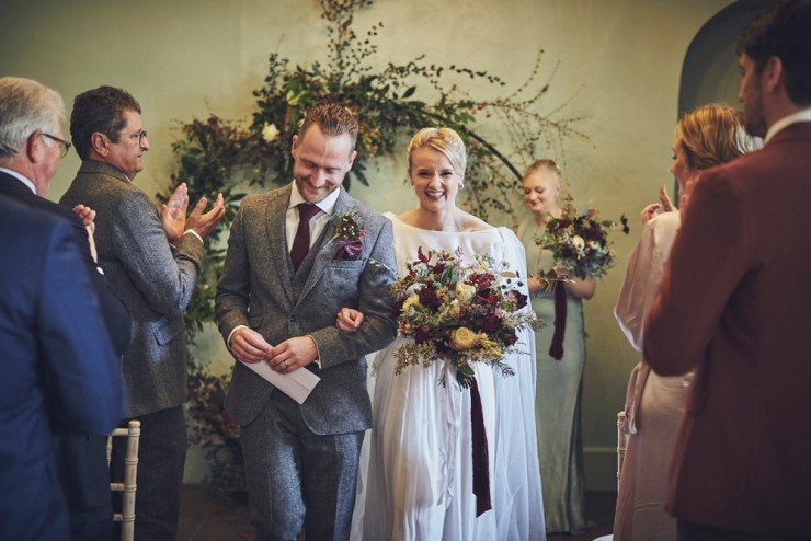 candid wedding photography of an Autumn wedding in the barn at Hotel Endsleigh in Devon