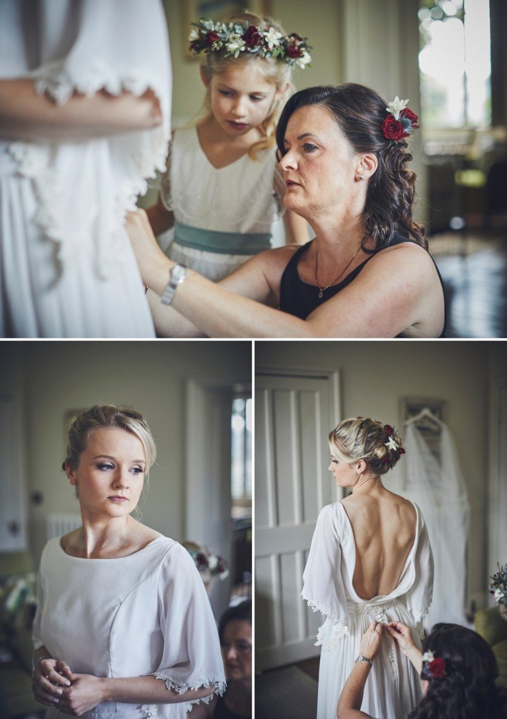 candid photography of mother of bride doing up wedding gown by Aisla Munro during bridal preps at Hotel Endsleigh in Devon