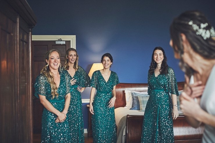 bridesmaids see bride before small ceremony at Rockbeare manor Devon