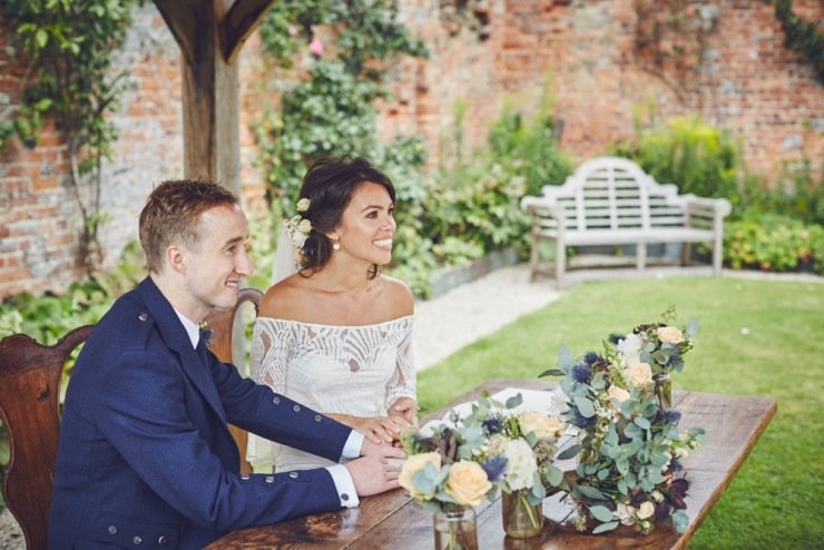 candid wedding photography of signing the register Kingston Estate Devon