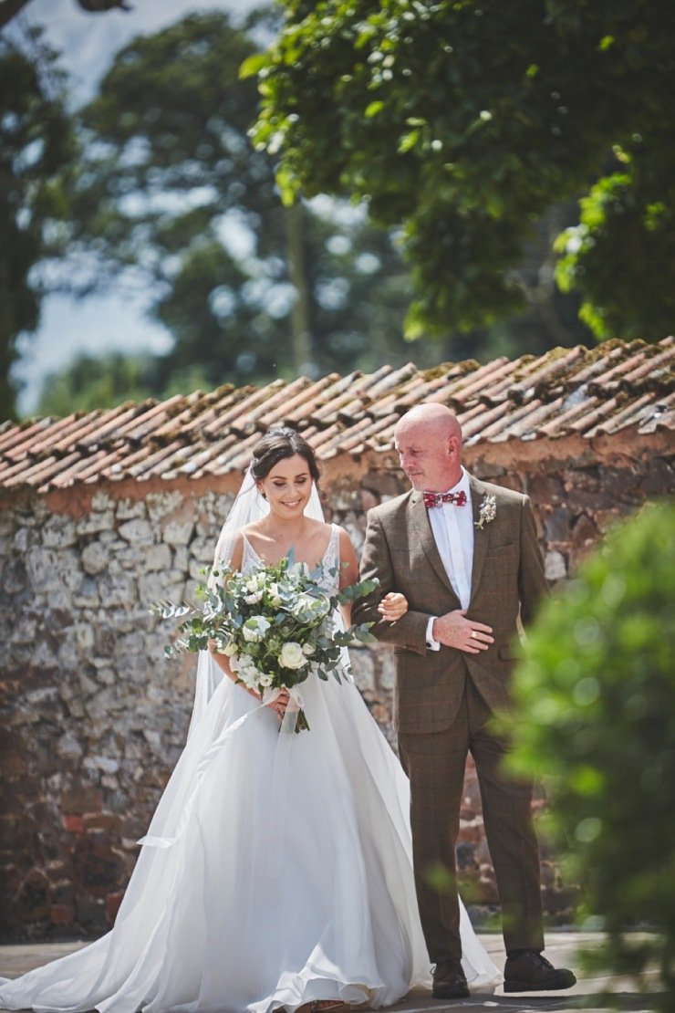 relaxed wedding photography Upton Barn and walled garden Devon