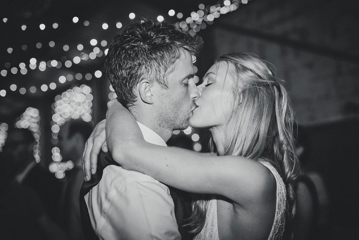 bride and groom doing their first dance at festival style barn wedding in devon