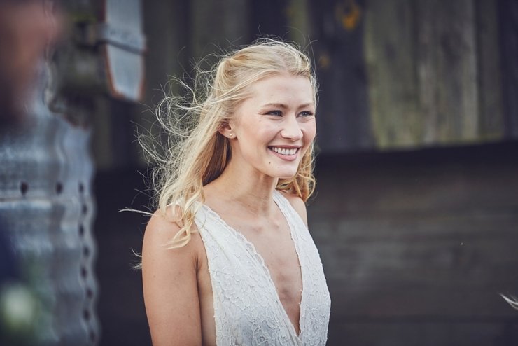 bride smiling before wedding at East Soar in Devon