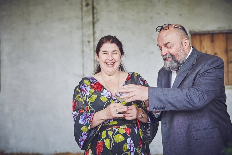 natural wedding photo of happy guest at eco wedding at East Soar Farm in Devon