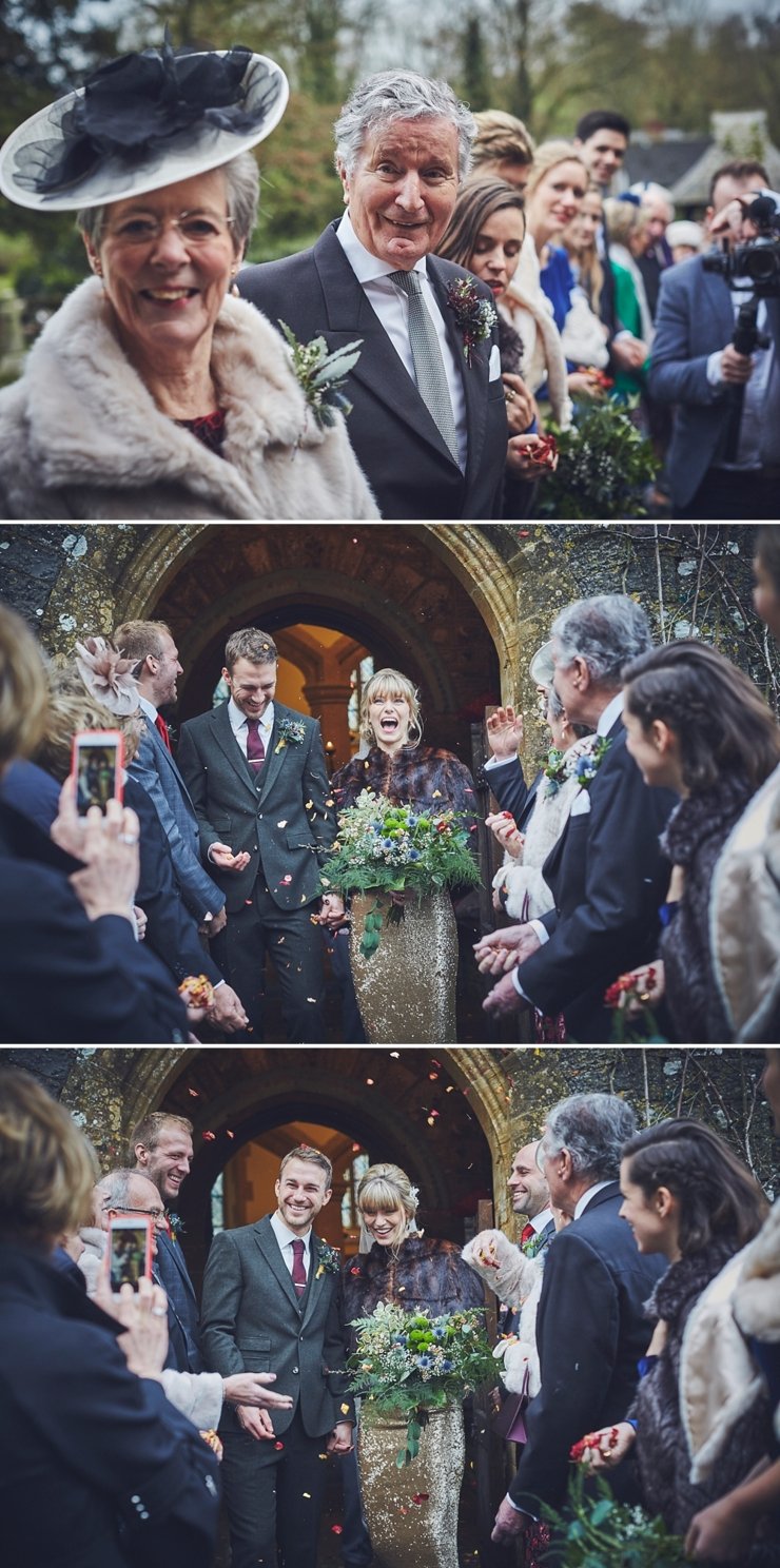 bride and groom laughing as they step out into confetti throw at a wedding at Huntsham Court in Devon