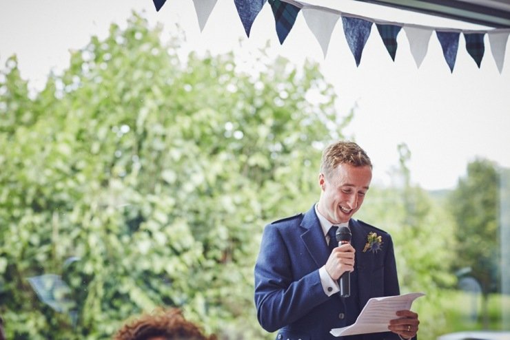 relaxed wedding photography of speeches at Kingston Estate Devon