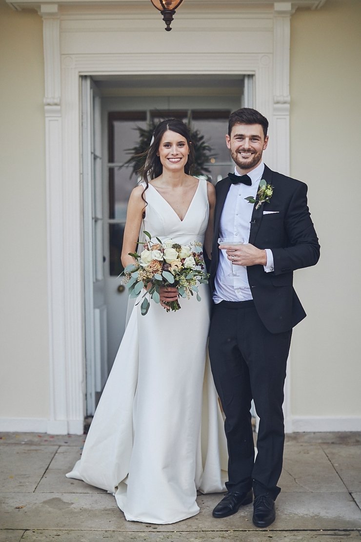 relaxed wedding photography of bride and groom at mini black tie wedding in Devon