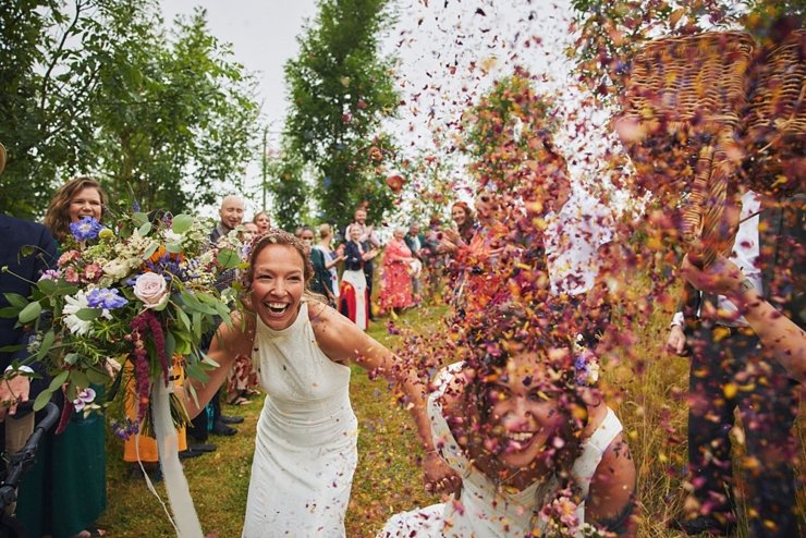 confetti throw with bride and bride at higher Holcombe Devon
