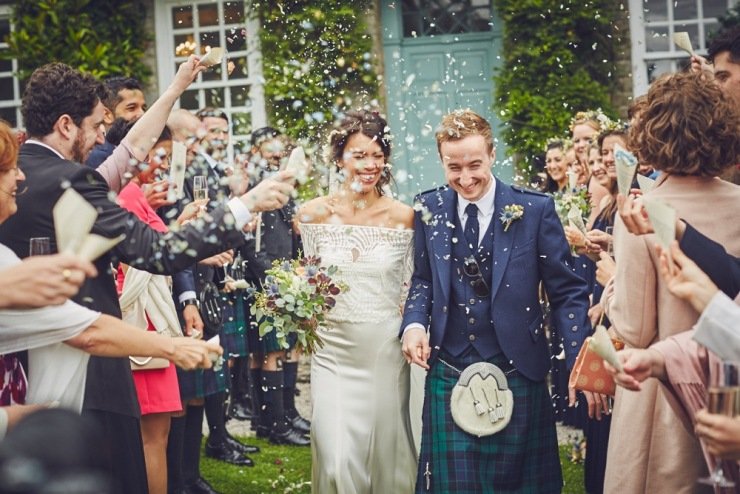 documentary photography of confetti throw at Kingston Estate wedding Devon