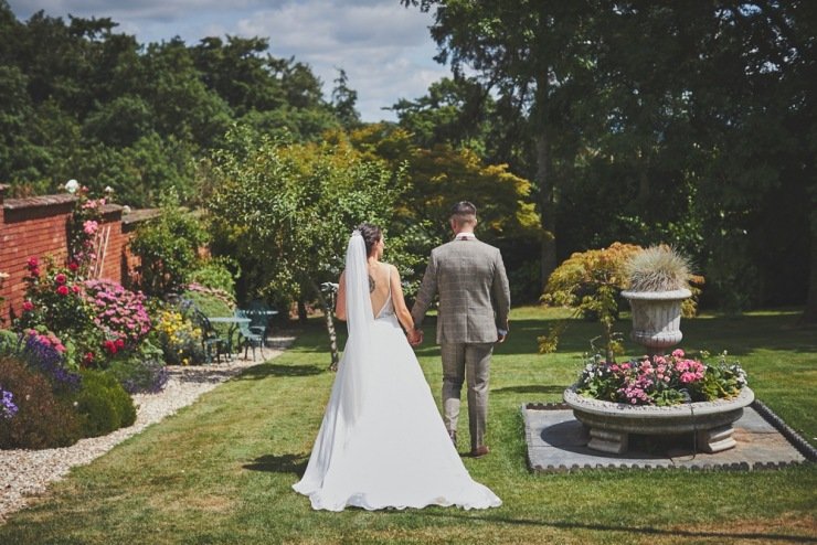relaxed wedding photography Upton Barn and walled garden Devon